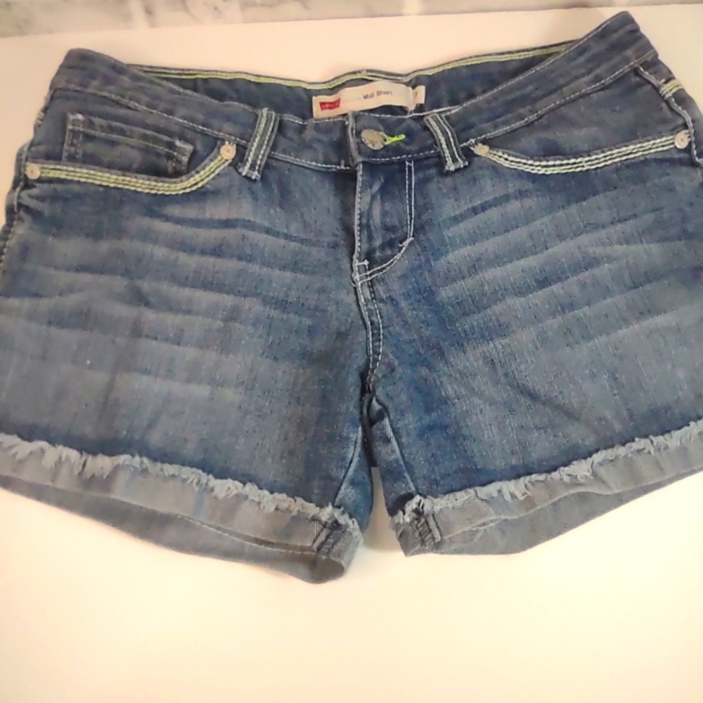 7 Levi's Blue Jean Shorts with Rolled Hems and Natural Fading